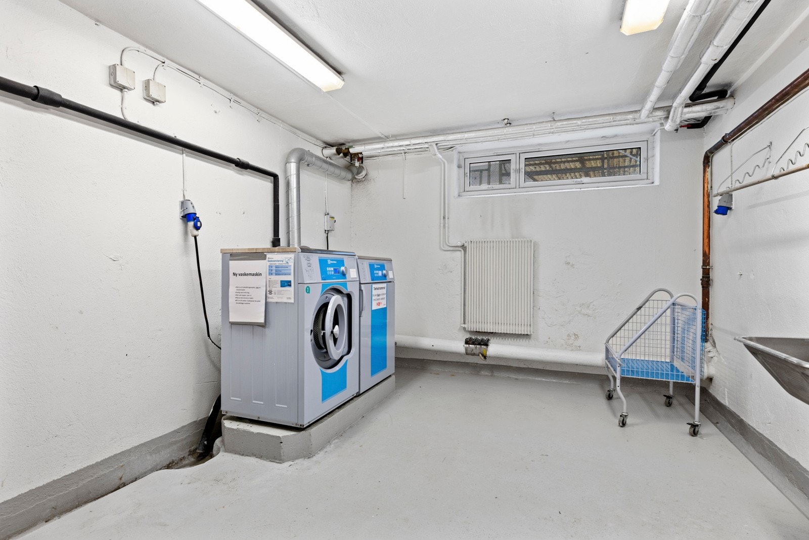 Sameiet har felles vaskeri i kjeller. Galleribilde