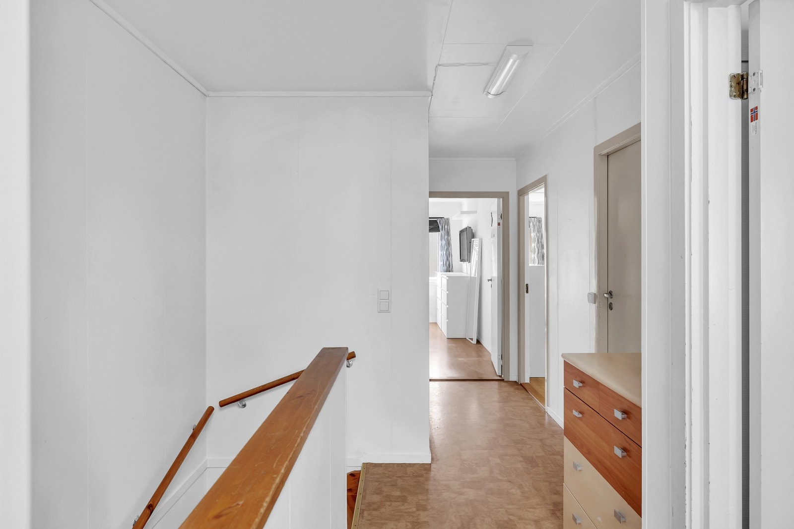 I andre etasje ligger boligens tre soverom, bad og en praktisk bod. Galleribilde