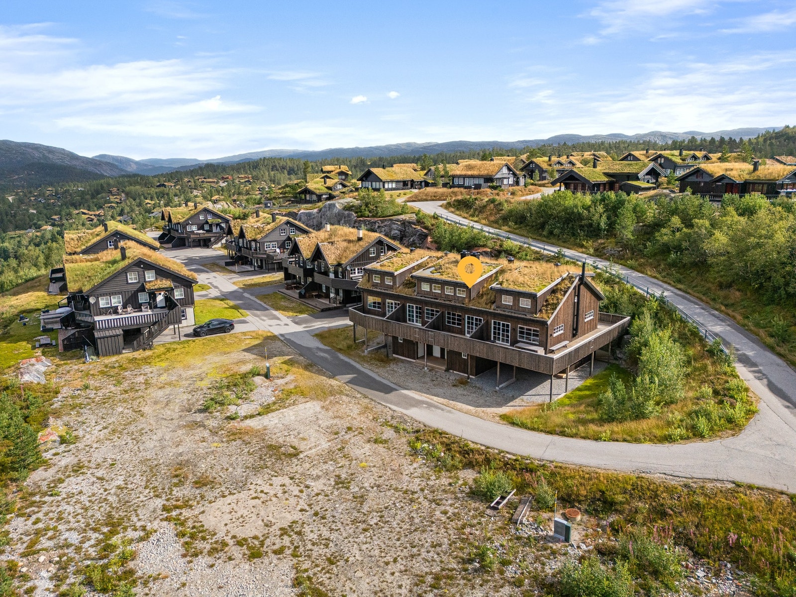 Dronefoto over hytteområdet Galleribilde