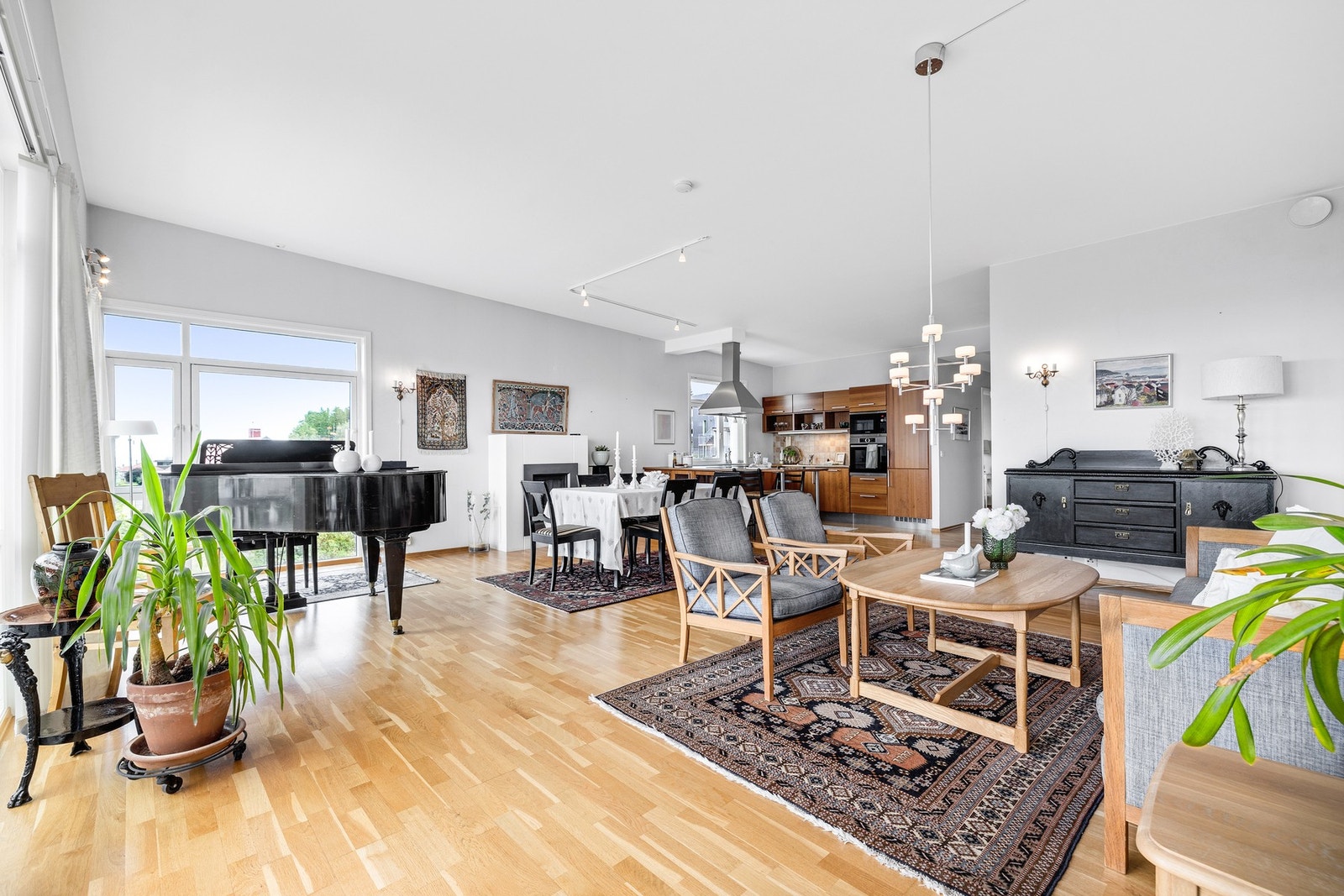 Åpen stue kjøkkenløsning på totalt 55,4 m² Galleribilde