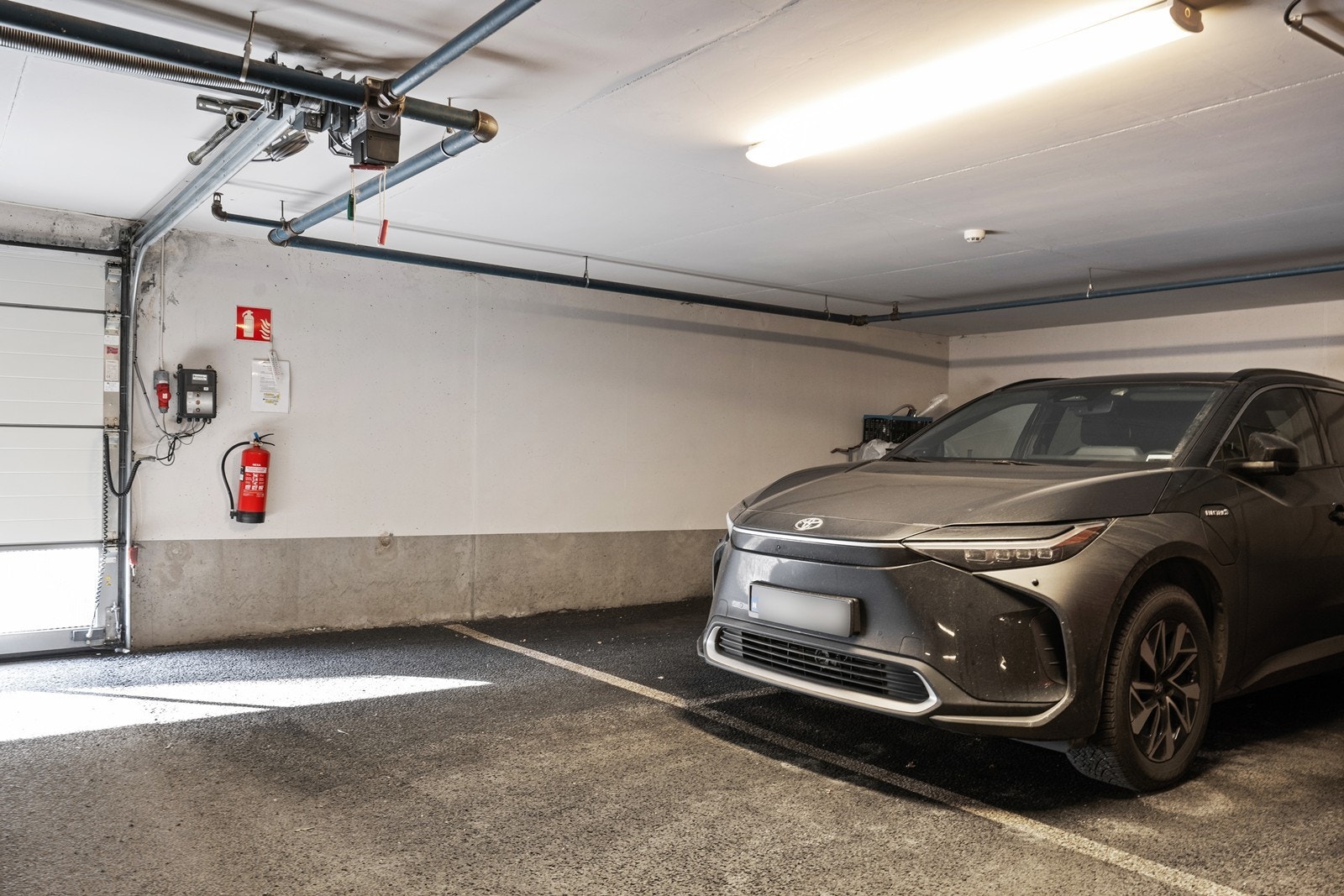 Det følger med 2 parkeringsplasser til leiligheten Galleribilde