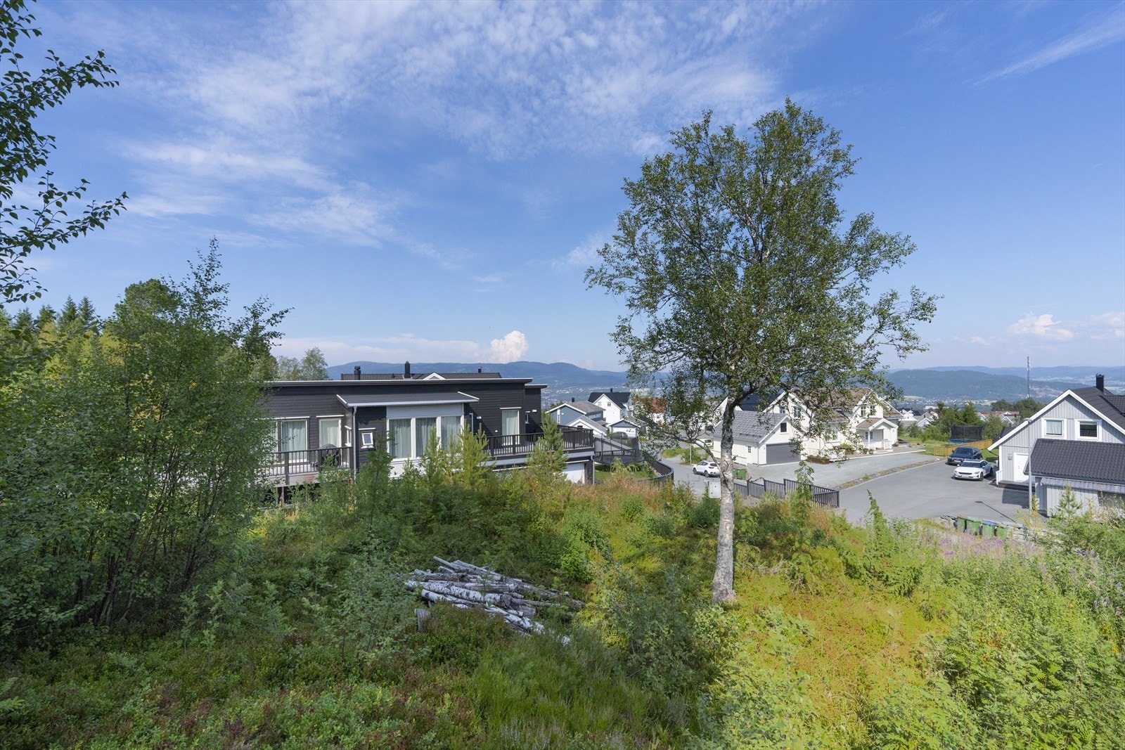 Gaten ender i blindgate som sørger for lite gjennomgangstrafikk og et rolig gatemiljø Galleribilde