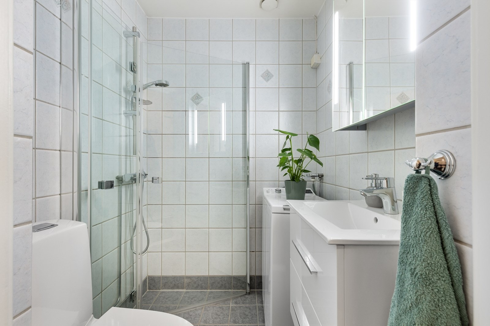 Flislagt bad med gulvvarme. Galleribilde