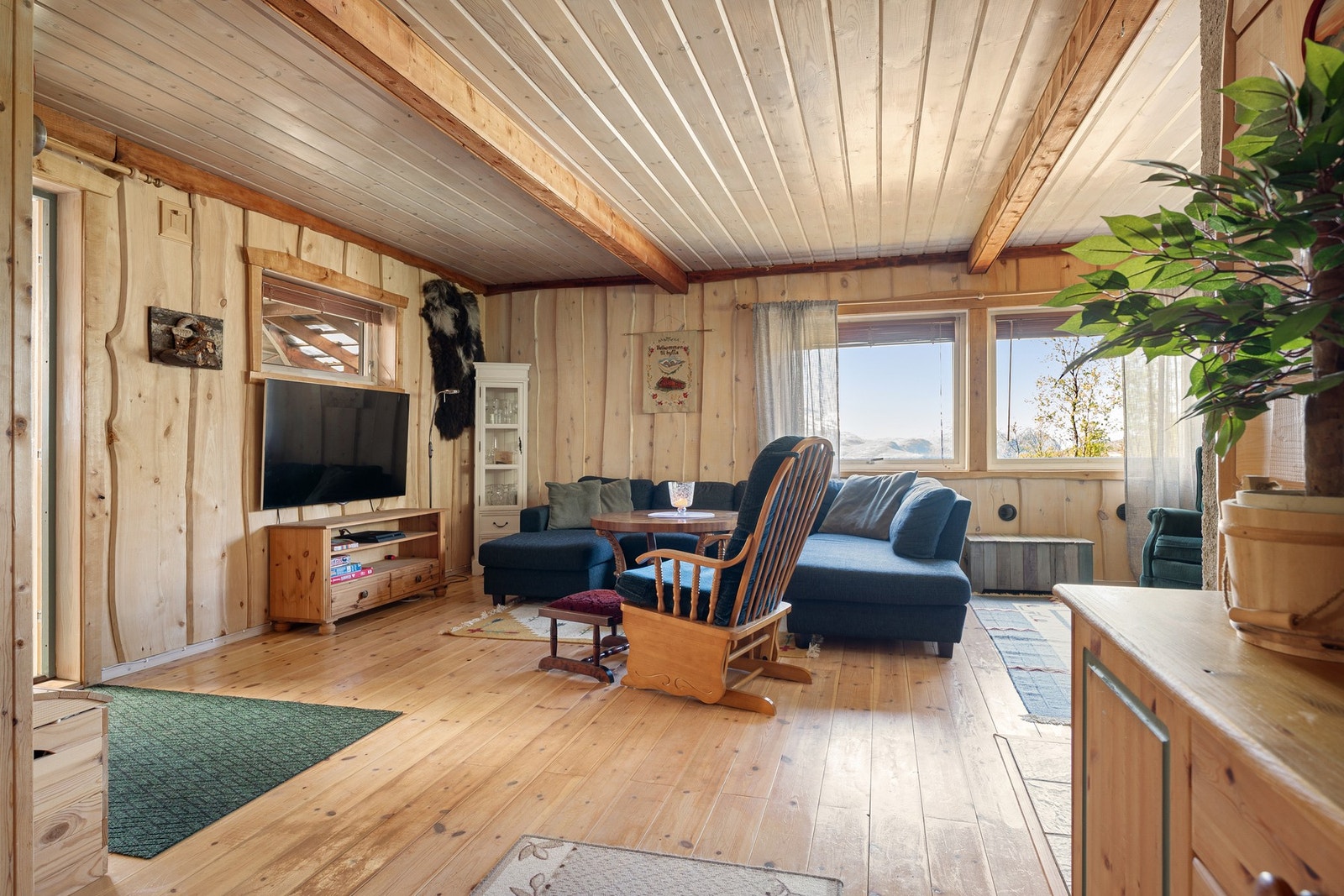 Naturlige materialer gir en varm og innbydende atmosfære Galleribilde