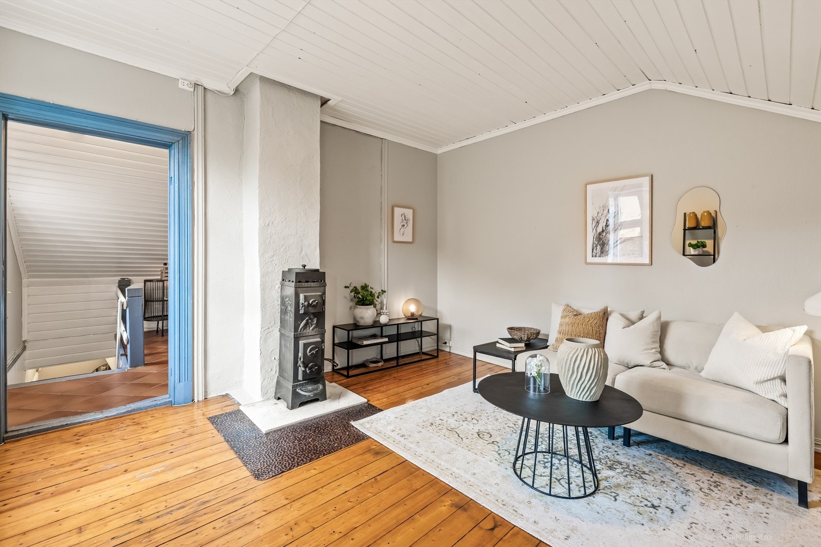 Stue med vedovn. Galleribilde