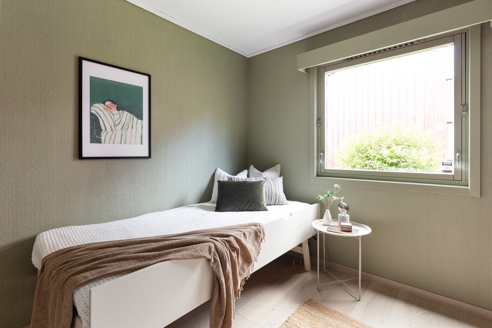 Et stort vindu gir godt naturlig lysinnslipp. Galleribilde