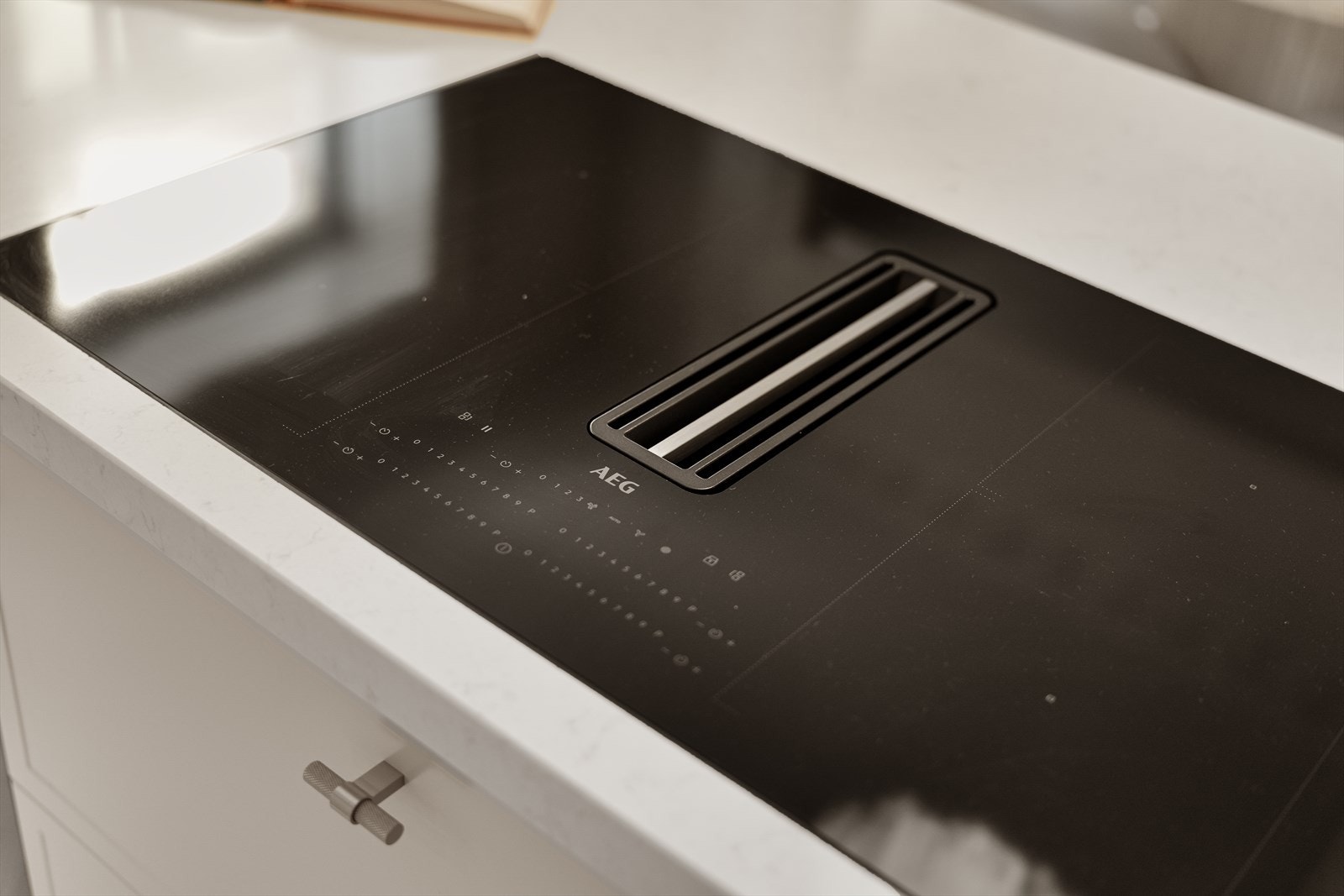 Integrert kullfilter ventilator i platetopp. Galleribilde