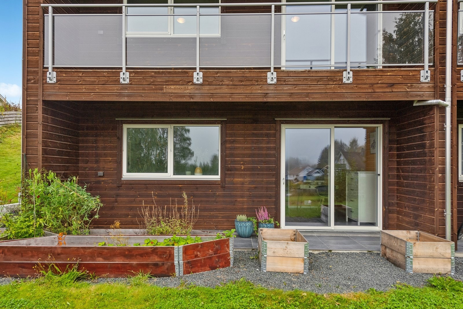 Tilgang til uteområdet via skyvedører. Galleribilde