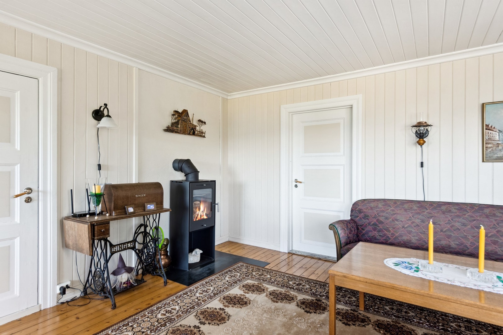 Rehabilitering av pipeløp og montering av ny peisovn i stua fra 2020. Galleribilde