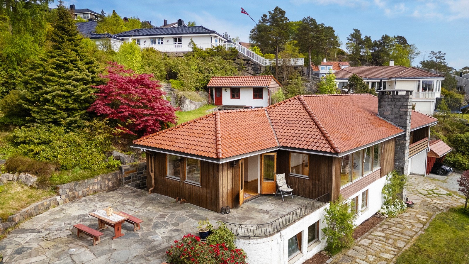 I bakkant av huset er det uthus på 20 m² Galleribilde