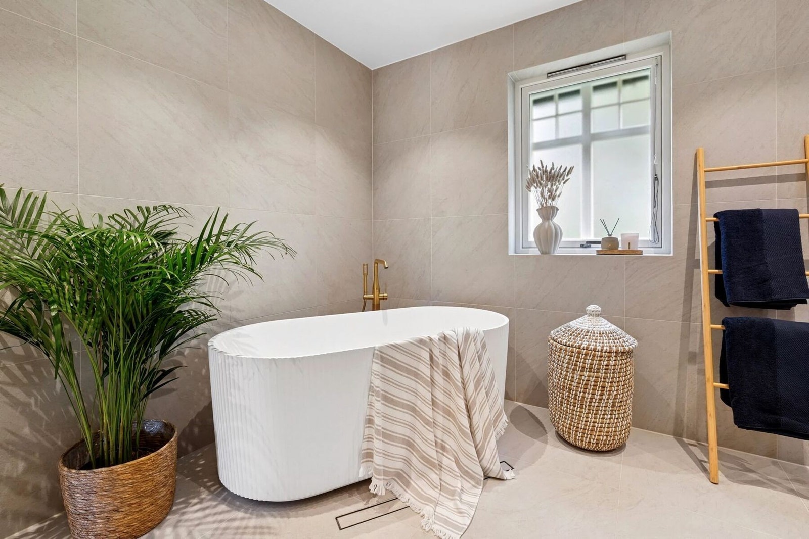 Badet har både dusj og badekar. Galleribilde