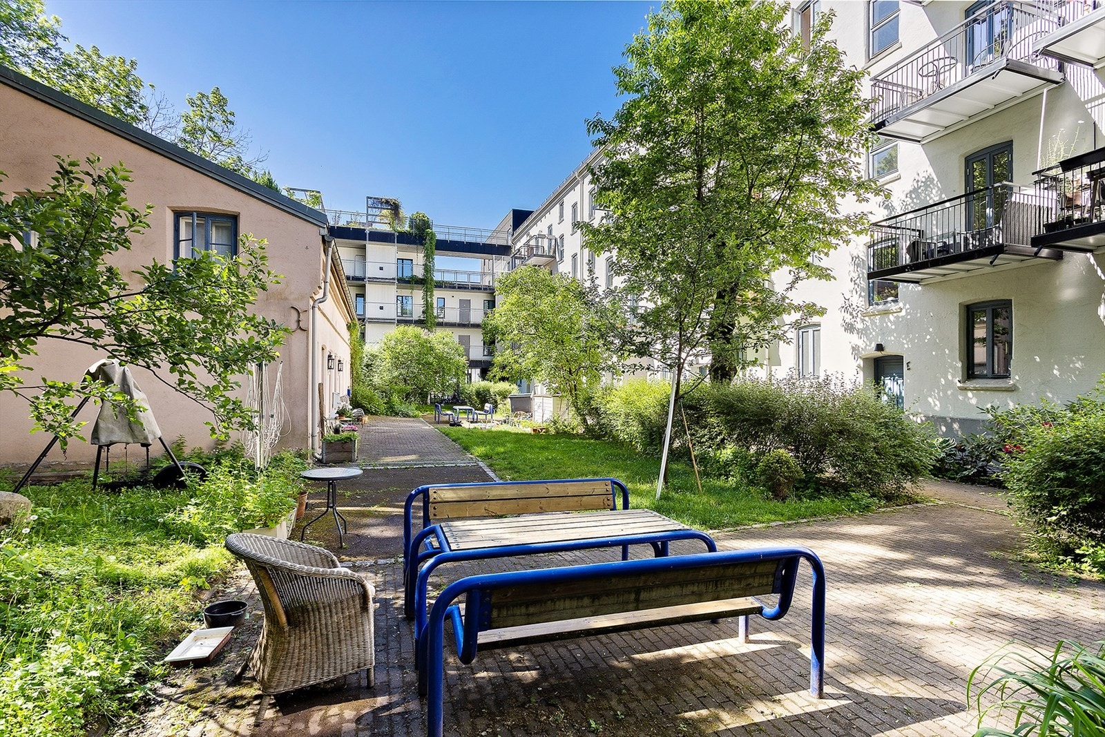 Skjermet bakgård som benyttes flittig av beboerne Galleribilde