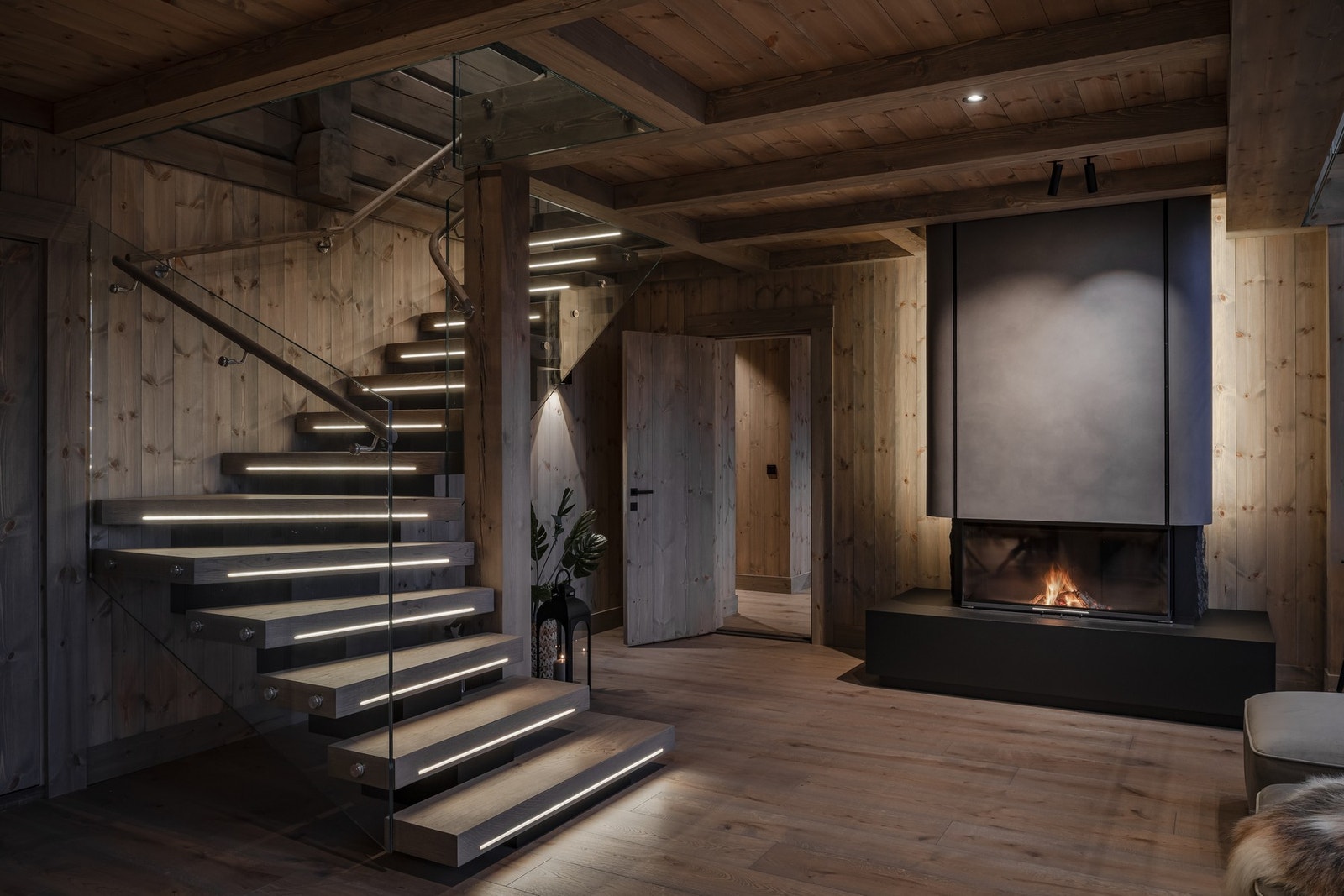Lekker trapp med lysstripe og peis som gir god atmosfære (Bilde fra lignende hytte i samme område, avvik kan forekomme) Galleribilde