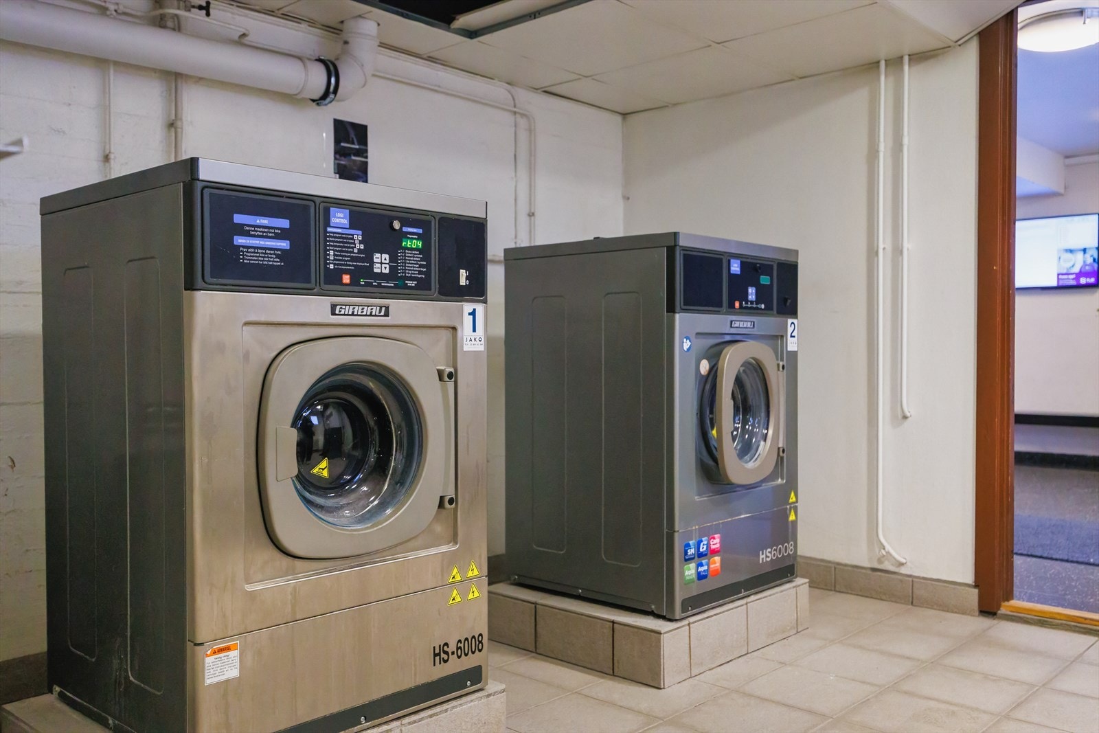 Det er felles vaskekjeller for beboerne i bygget. Galleribilde