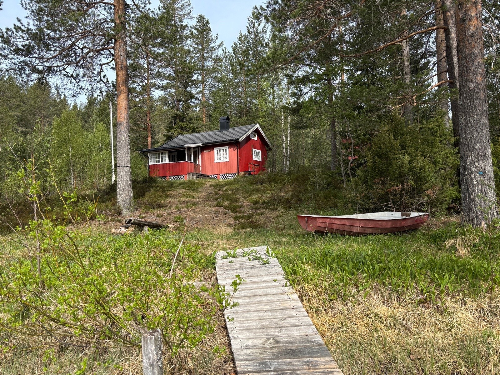 Tomten går helt ned til vannet. Galleribilde