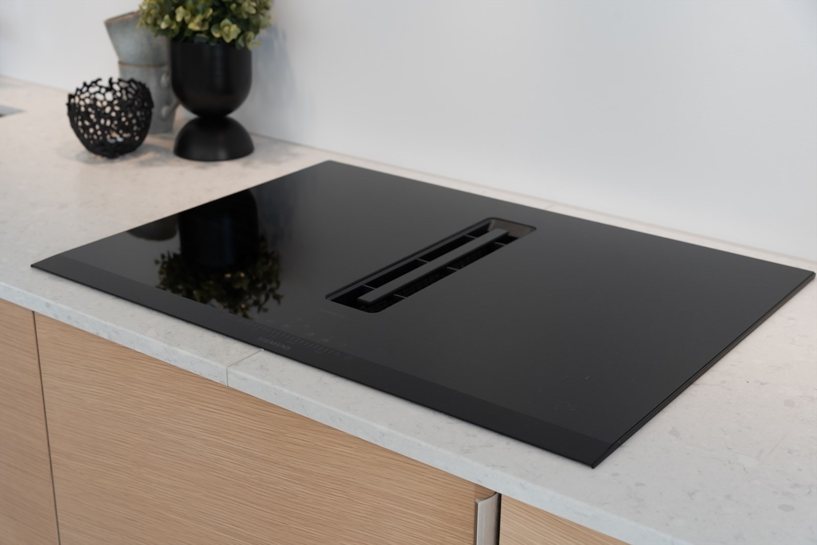 Keramisk induskjonstopp med integrert avtrekksvifte Galleribilde