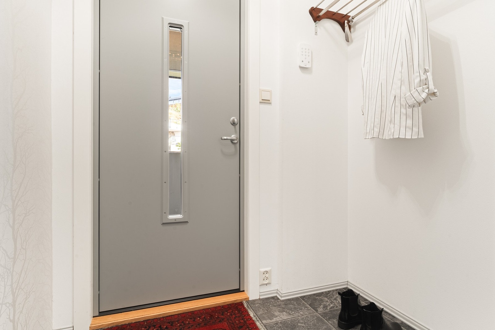 Entréen måles til 2,2 kvm. Galleribilde