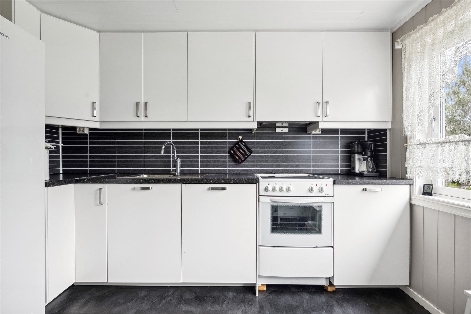 Flott kjøkken med tidløst uttrykk. Galleribilde