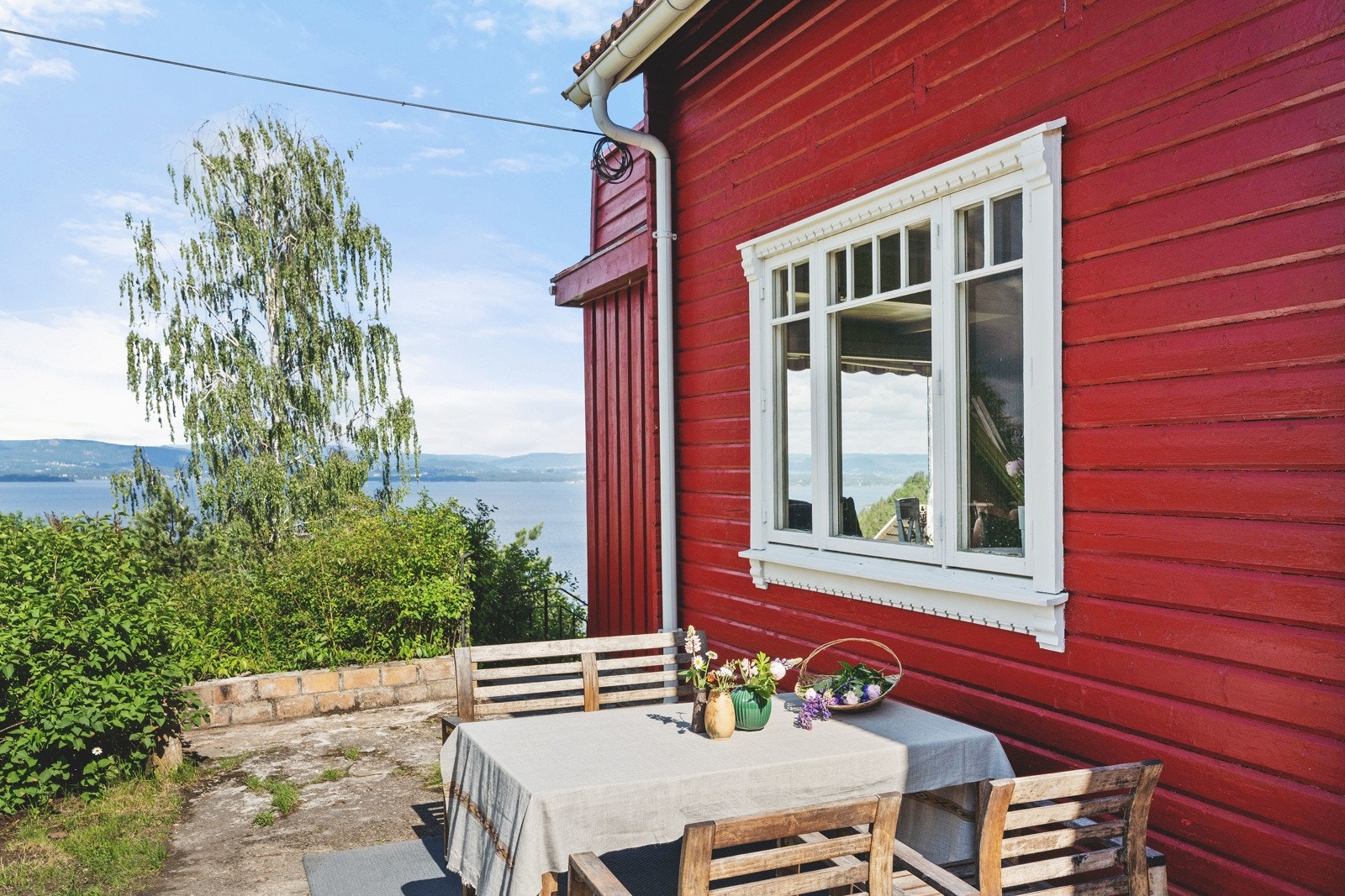 Her kan man nyte våren og sommeren på skjermede soner for kos og hygge Galleribilde