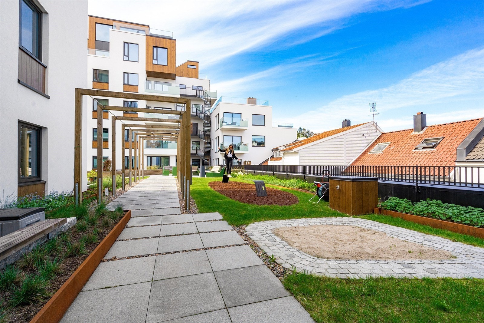 Leiligheten har bruksrett til felles hage i Byhaven Galleribilde