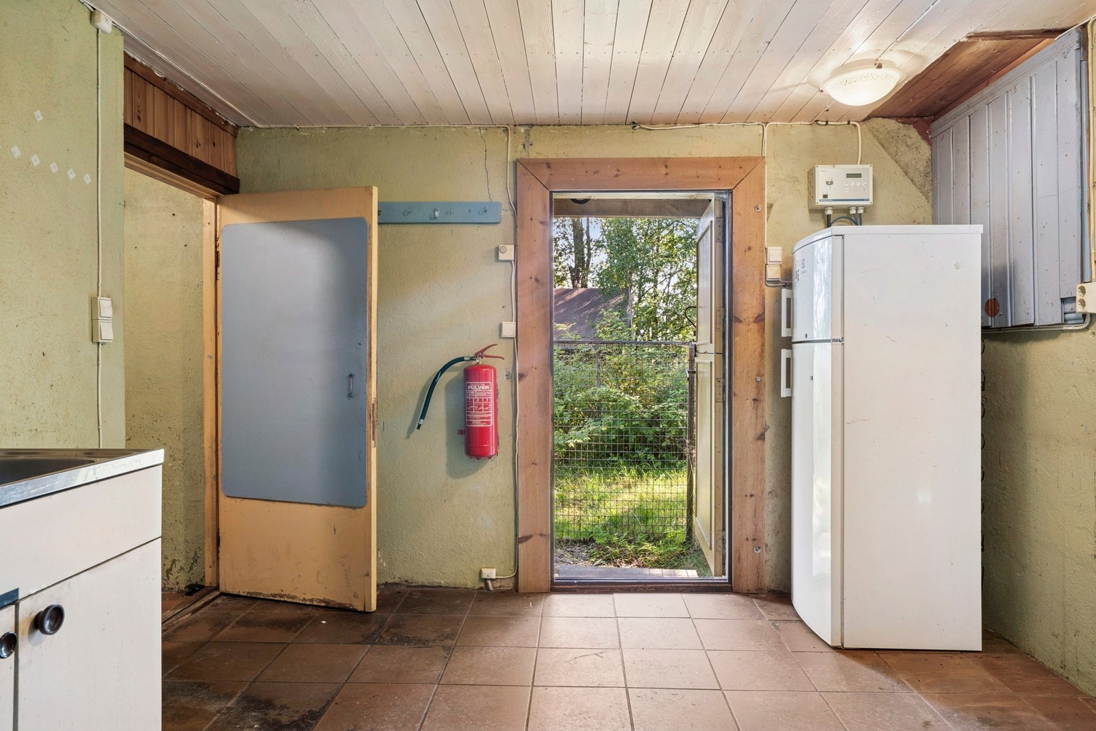 Ekstra inngang fra bakside på hus. Galleribilde