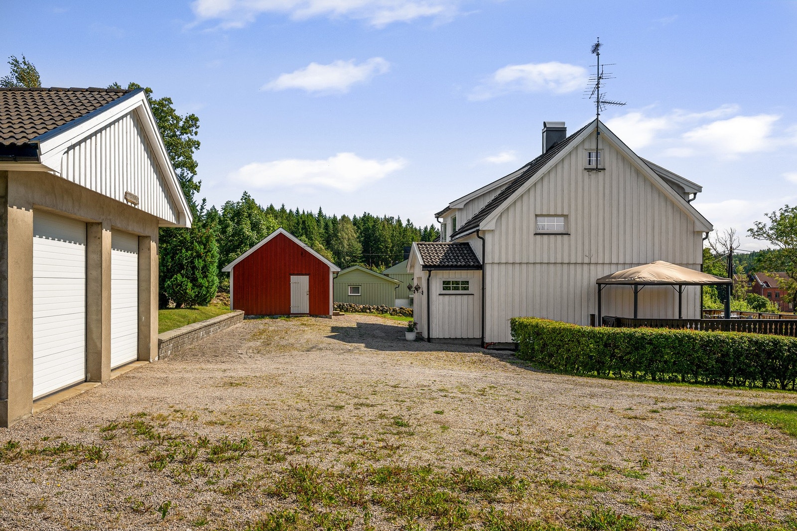 Sjarmerende uthus - Mange bruksmuligheter og ekstra plass til både hobby og lagring. Galleribilde