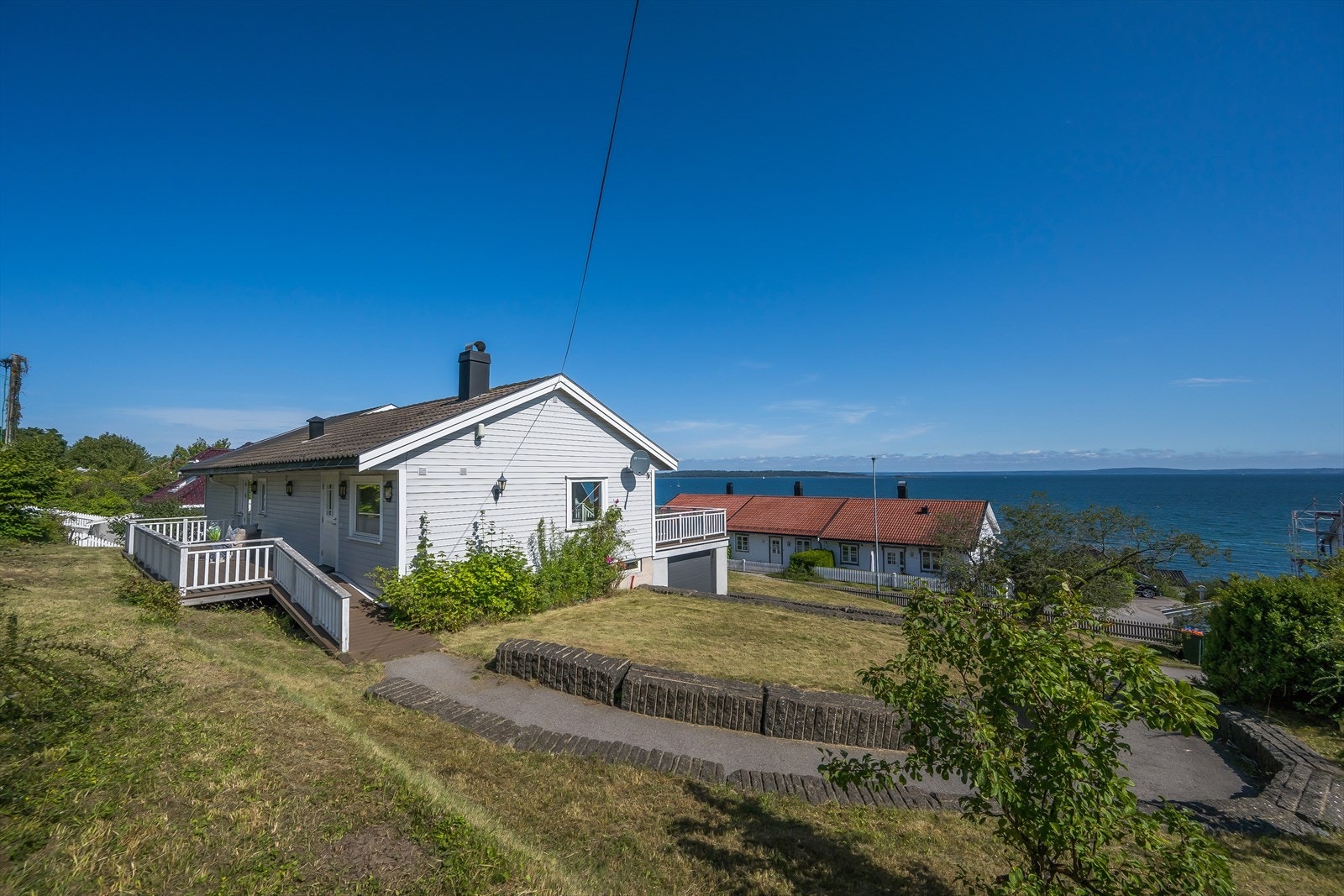 Fin hagetomt på 908 kvm. med potensiale. Galleribilde