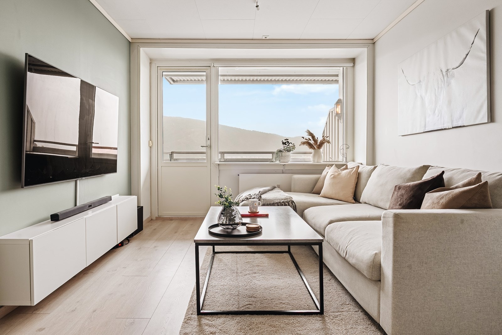 Stue med sentralvarme som inngår i fellesutgiftene Galleribilde