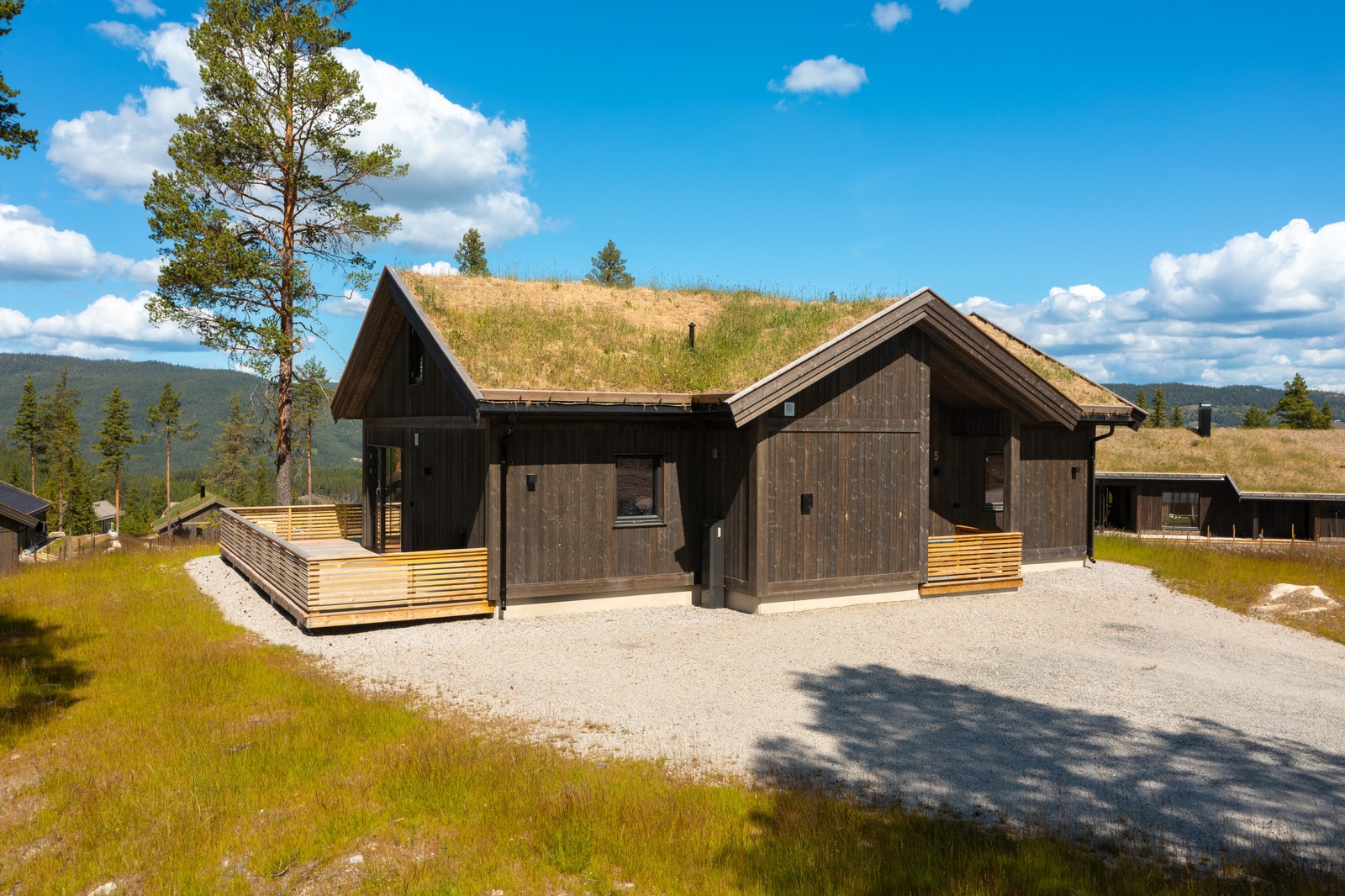 Hytten som er avbildet er av tilsvarende modell som bygges her på tomt 18 Galleribilde