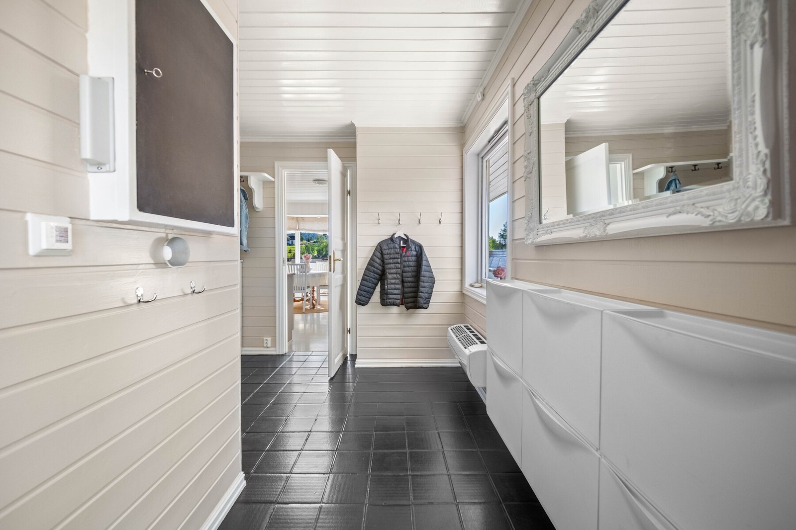 Entreen har også en varmepumpe for jevn og behagelig varme. Galleribilde