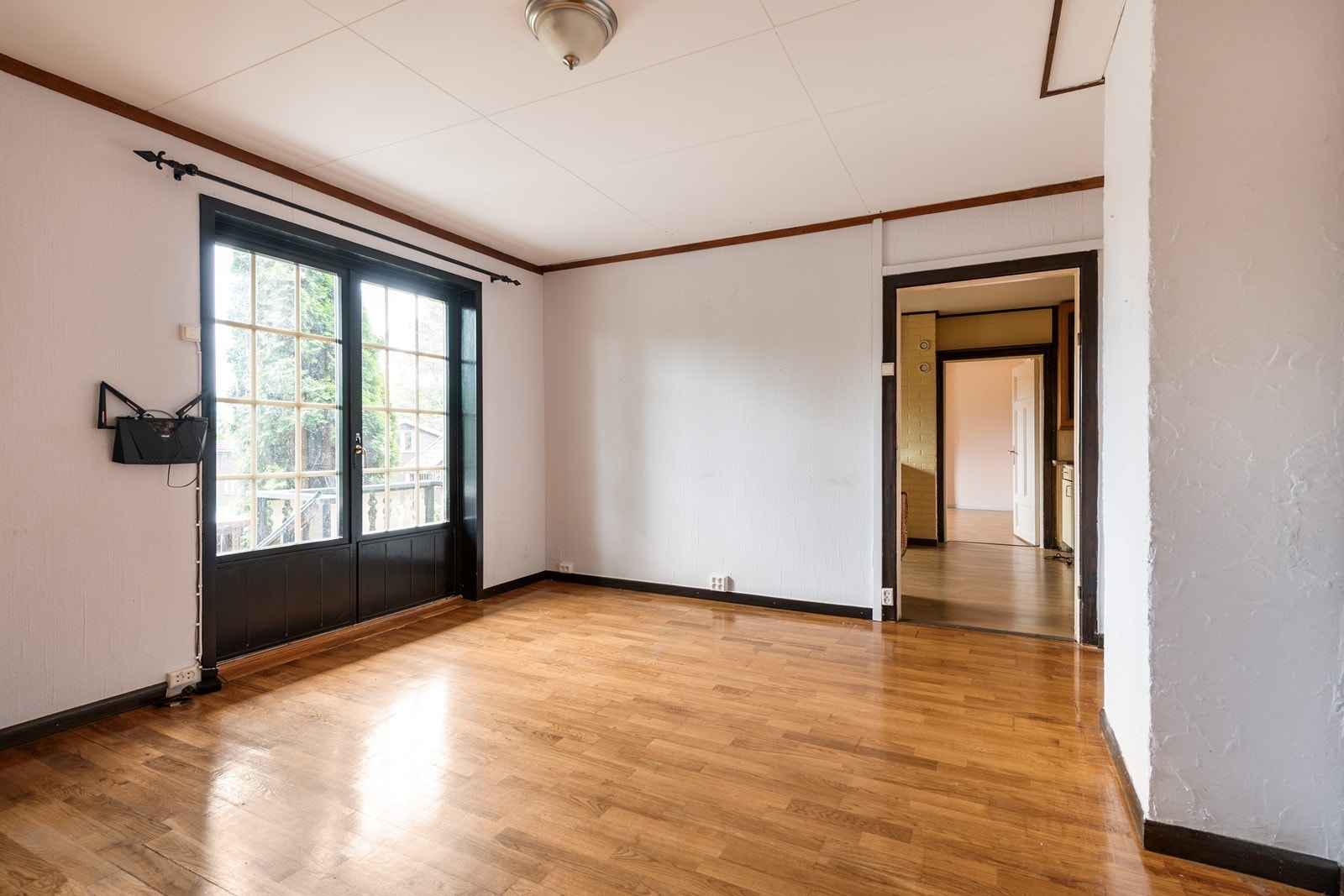 Verandaen går ut mot hagen Galleribilde