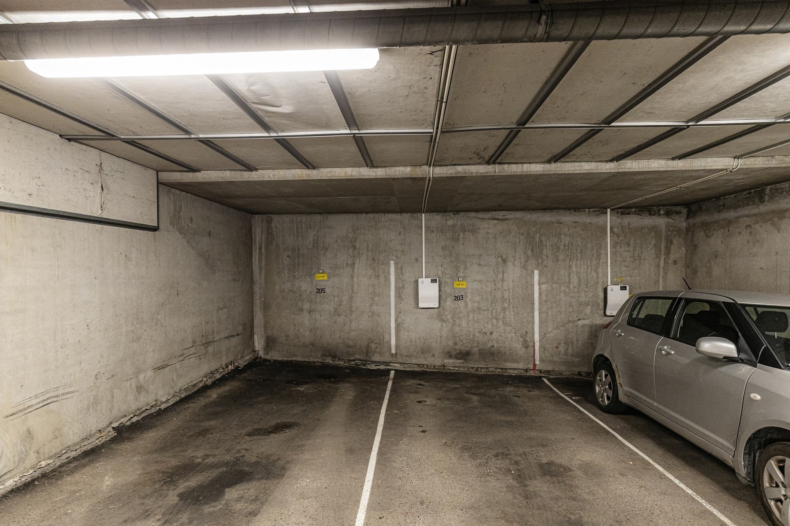 Garasjeplass 203 i fellesgarasjen følger leiligheten. Galleribilde