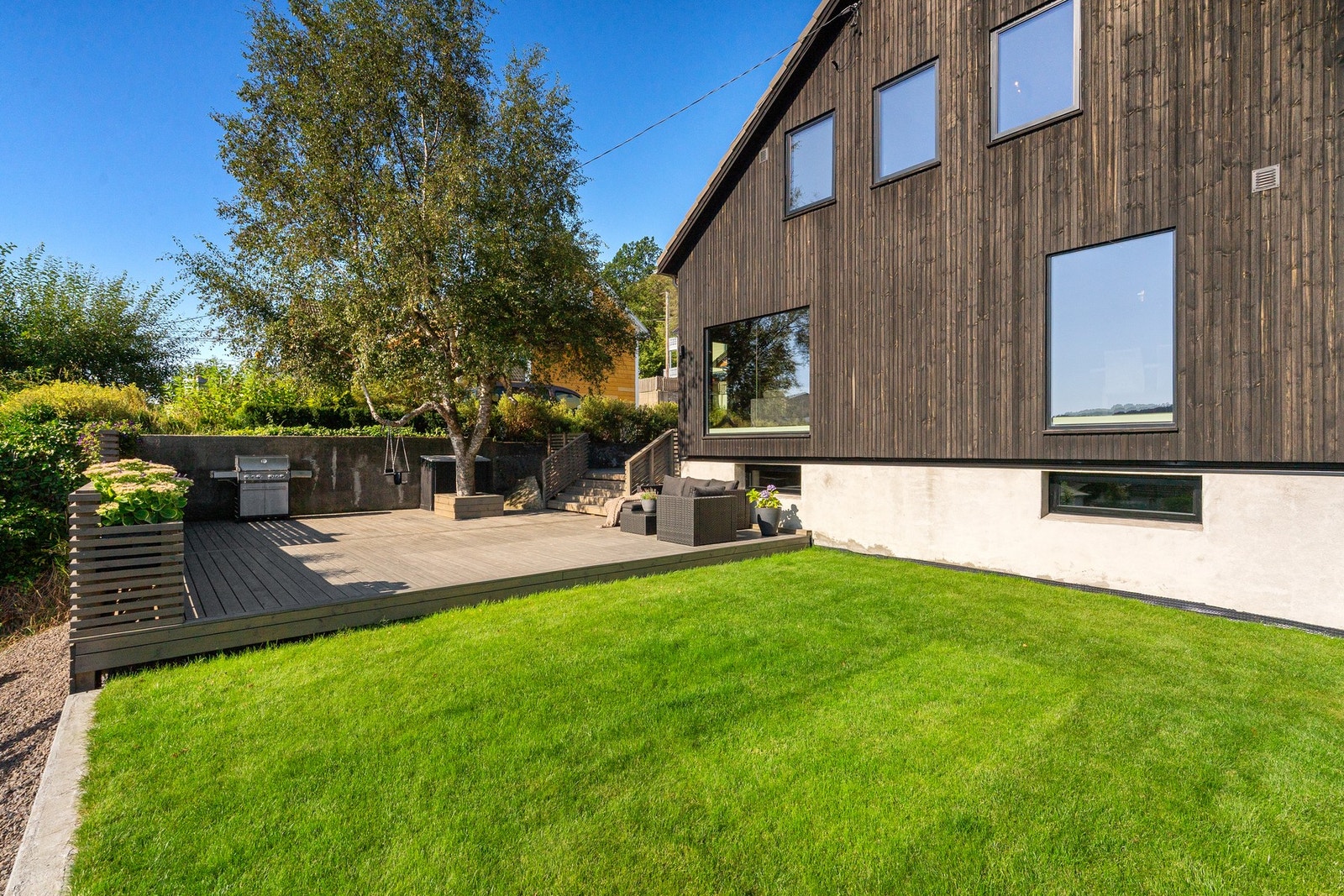 Kjekk, planert hage. Galleribilde