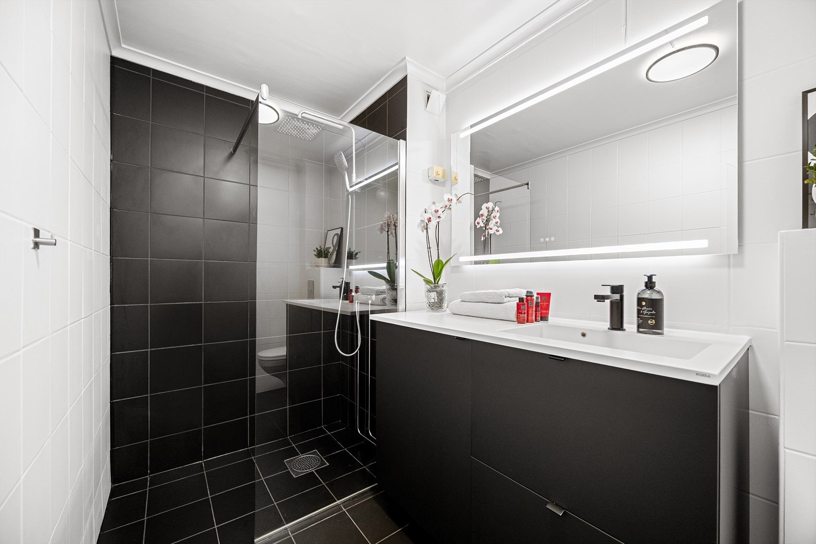 Pent flislagt og utvidet bad tatt i regi av borettslaget Galleribilde