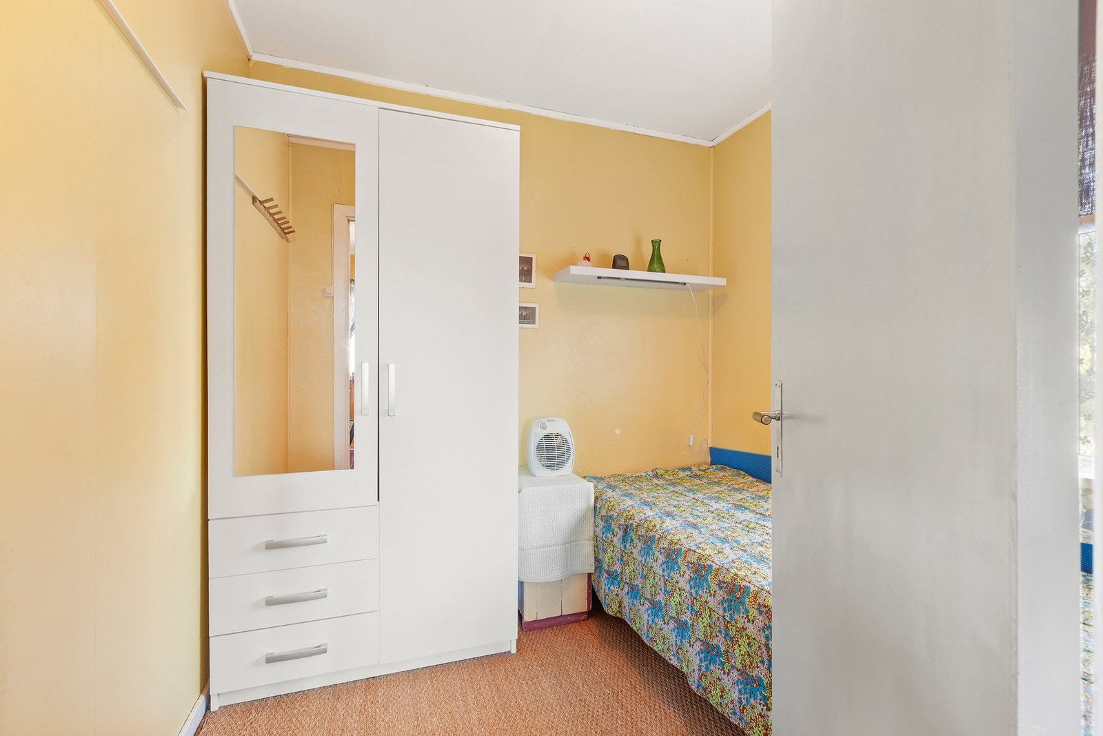 I 1.etasje har man ett soverom Galleribilde