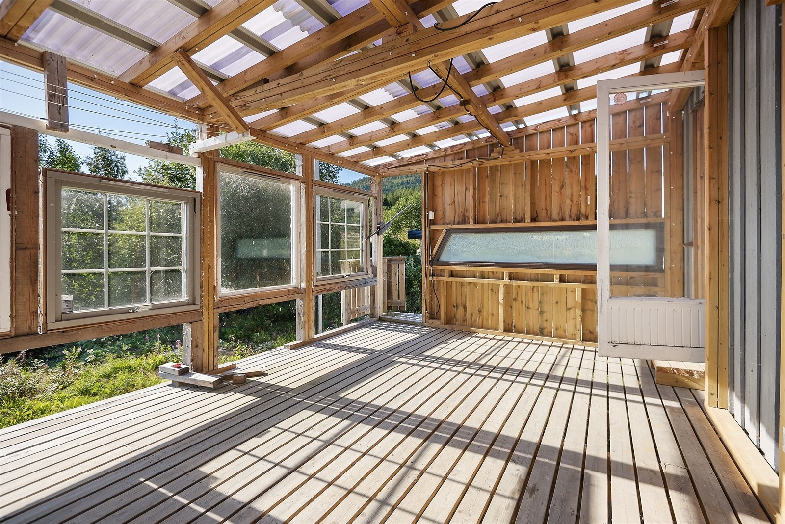 Plass til en sittegruppe ute på verandaen. Galleribilde