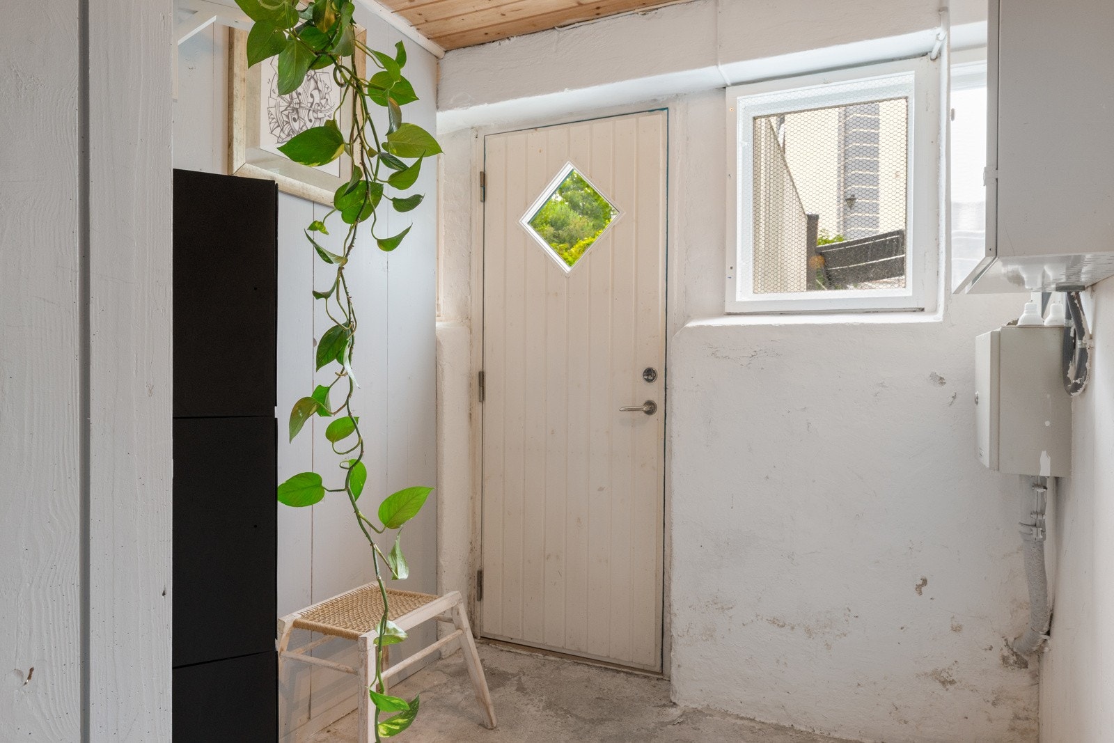 Det er egen inngangsdør ut til bakgård Galleribilde