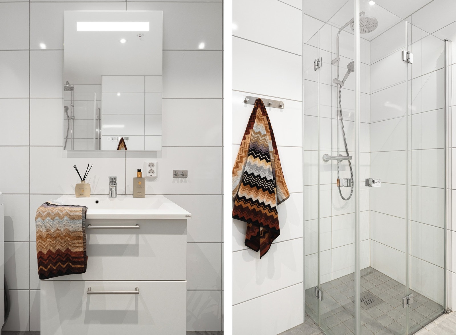 Det er innredet med dusj med glassvegger, vegghengt toalett, opplegg for vaskemaskin og baderomsinnredning. Galleribilde