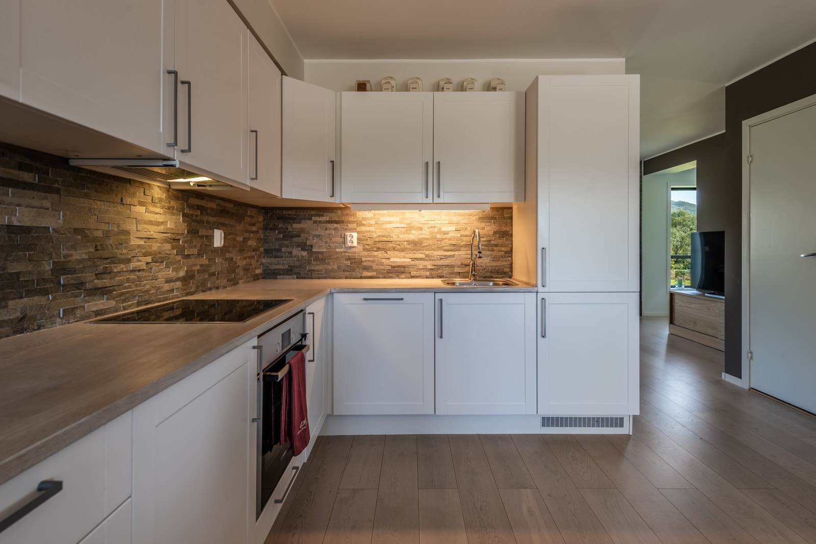 De lekre detaljene på kjøkkenet gir et stilig inntrykk Galleribilde