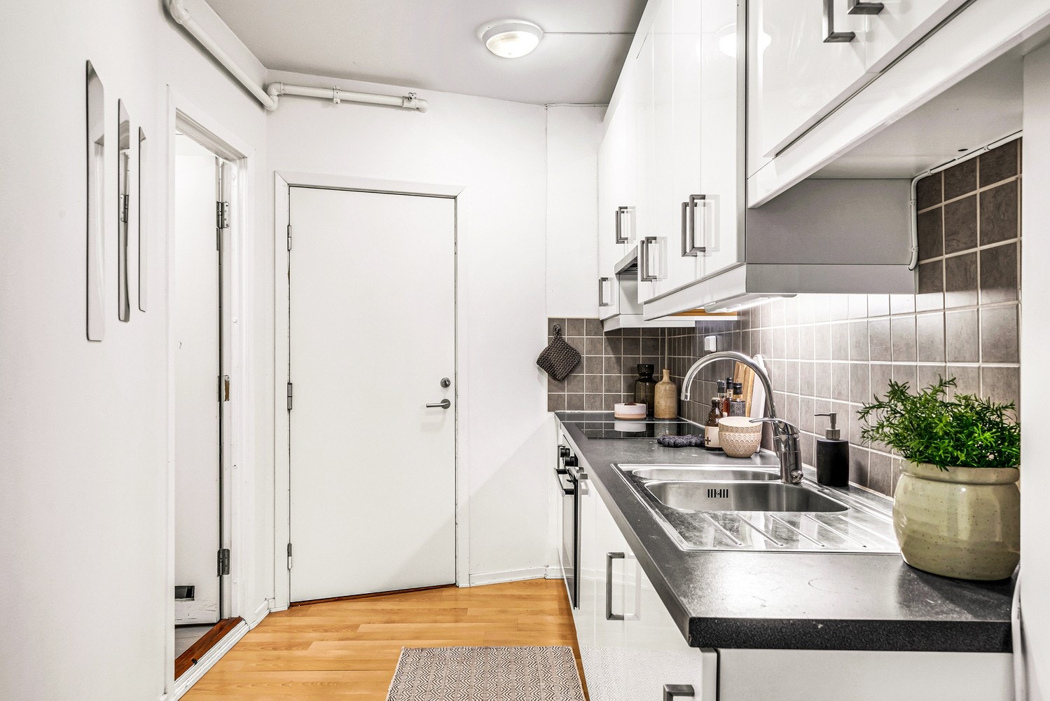 Adskilt stue/kjøkken som gir flere soner i leiligheten. Galleribilde