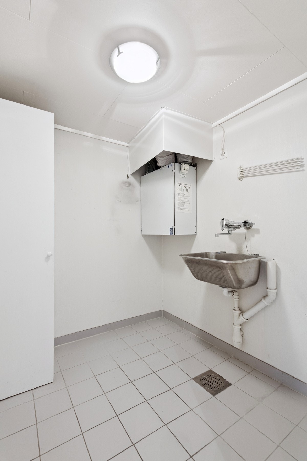 Vaskerom med utslagsvask. Galleribilde