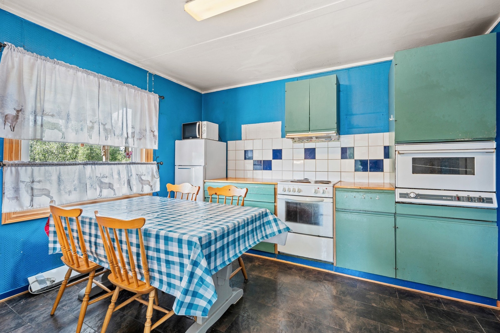 Kjøkkenet er på 12m². Galleribilde