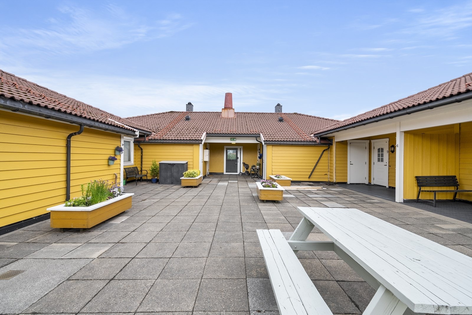 Tilbaketrukket felles uteområde for burettslaget i 3. etasje Galleribilde