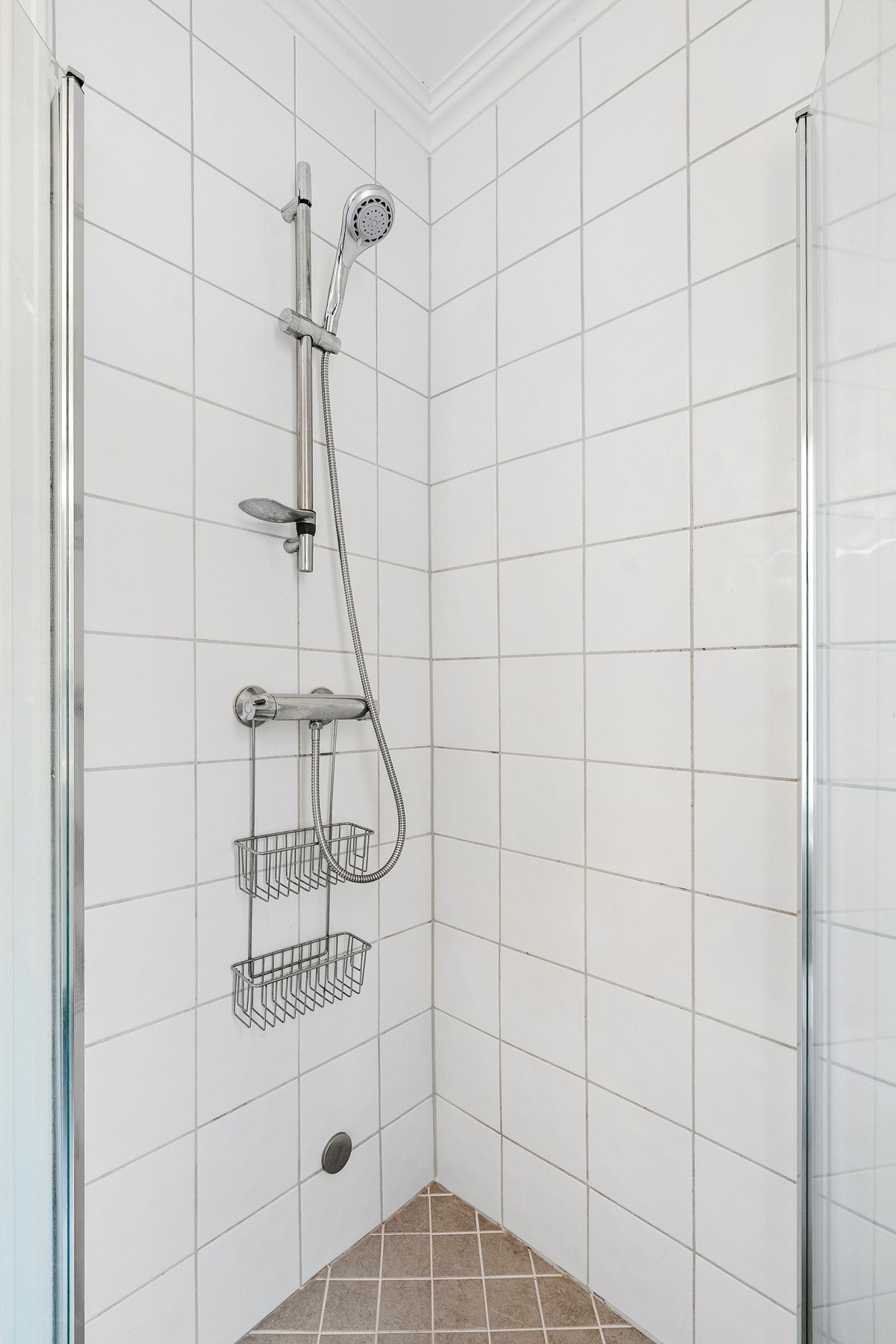 Flislagt dusjhjørne. Galleribilde