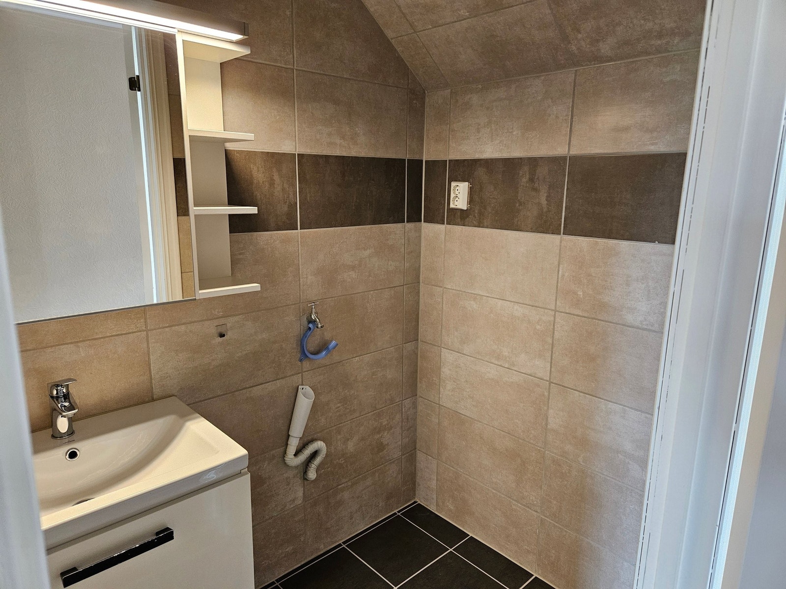 Mulighet for vaskemaskin på toalett hovedetg. Galleribilde