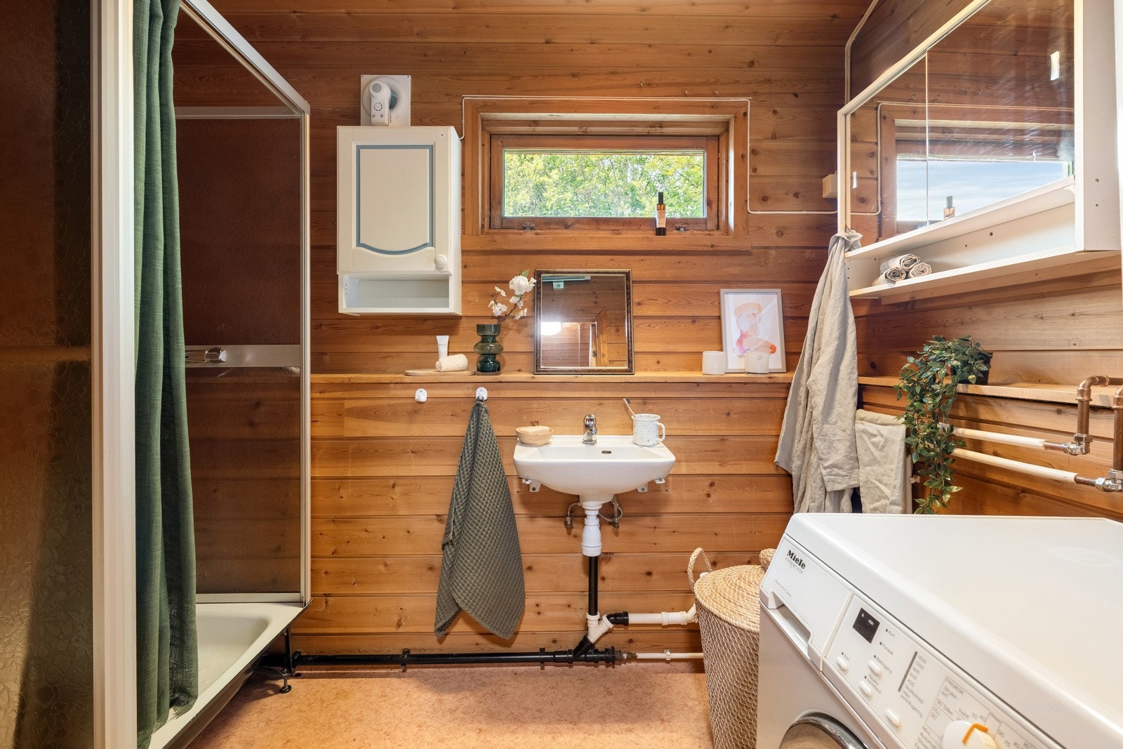 Badet er enkelt, men funsjonelt Galleribilde