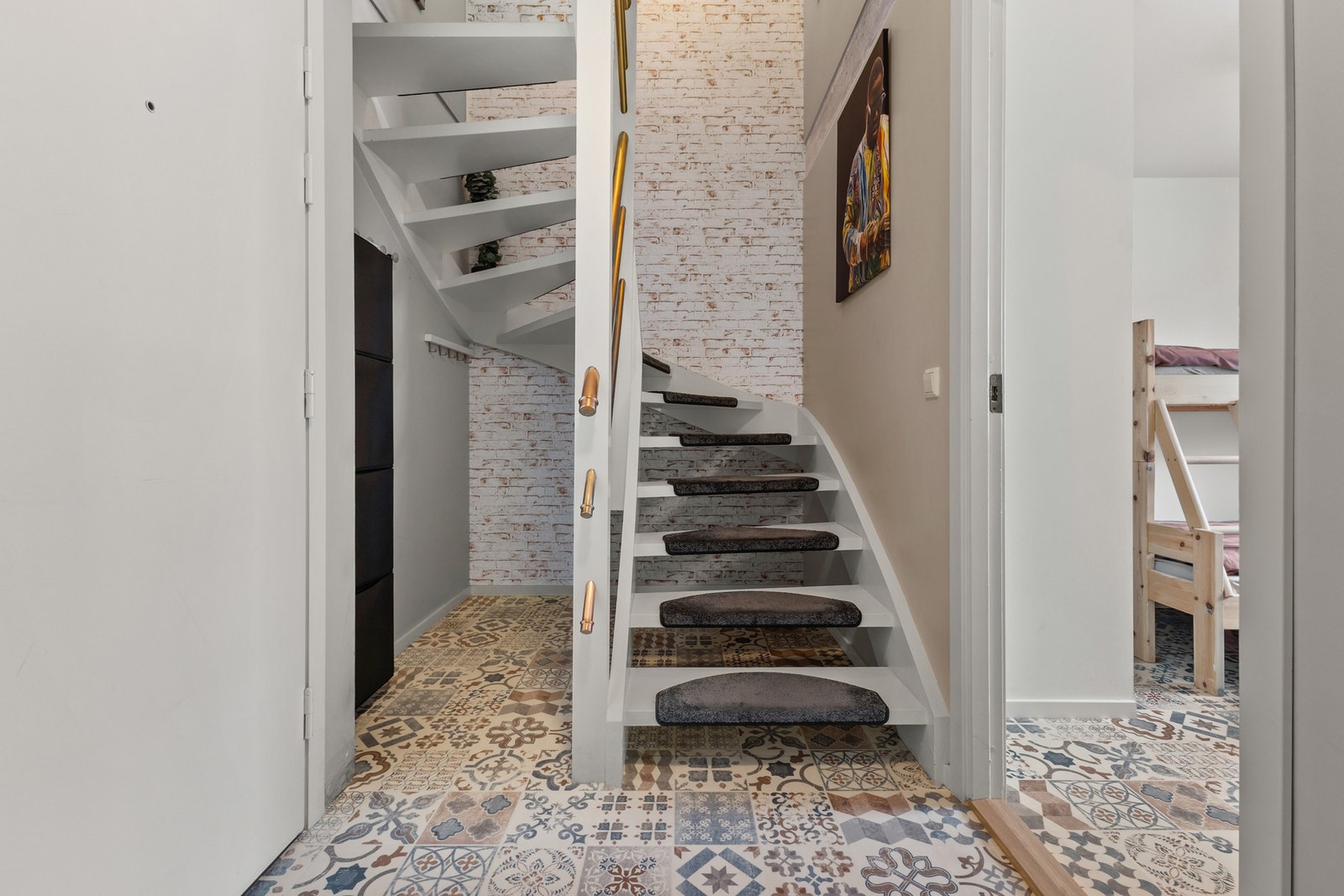 Trappen tar oss opp til leilighetens andre etasje Galleribilde