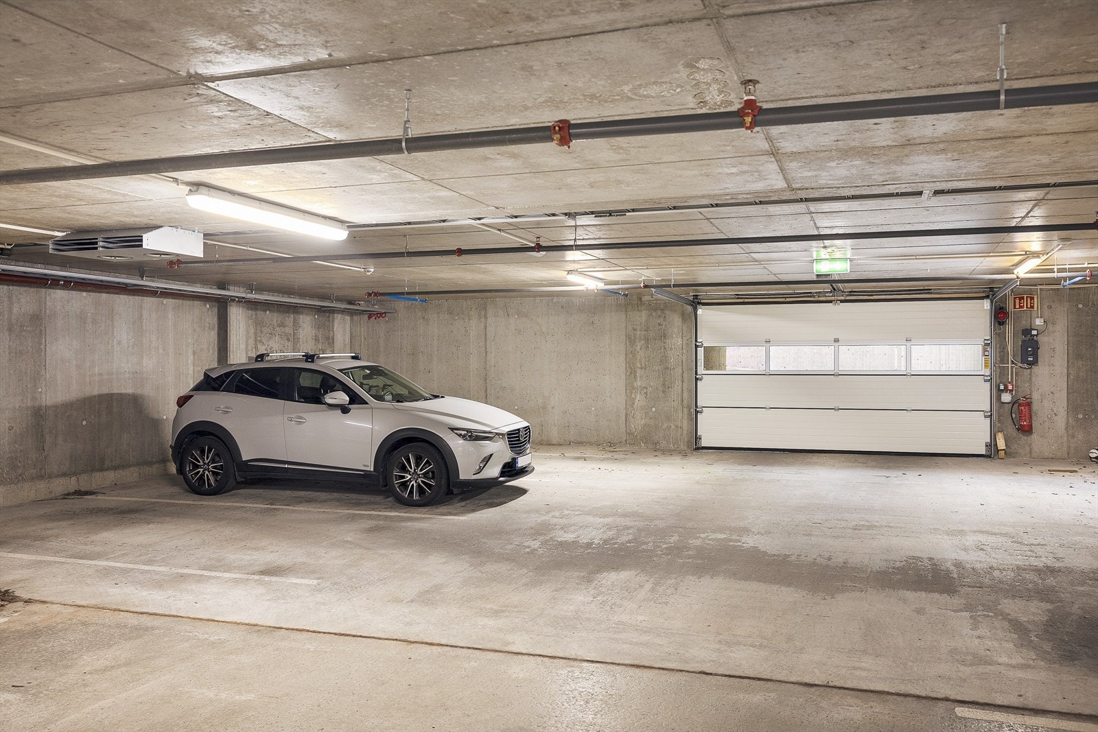 En parkeringsplass i multiparkanlegg kan kjøpes for kr. 390 .000,- per plass. | Anlegget er levert av Klaus Multiparking. Galleribilde