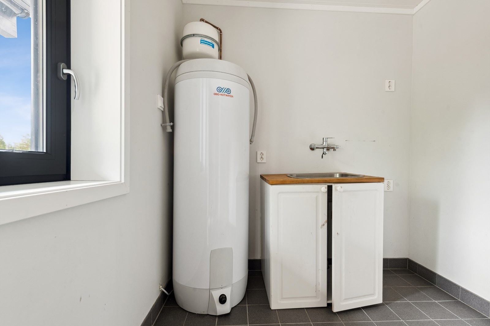 I 1. etasje er også et vaskerom. Galleribilde