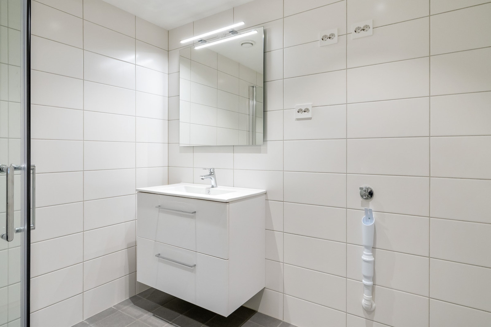 Badet har opplegg for vaskemaskin. Galleribilde